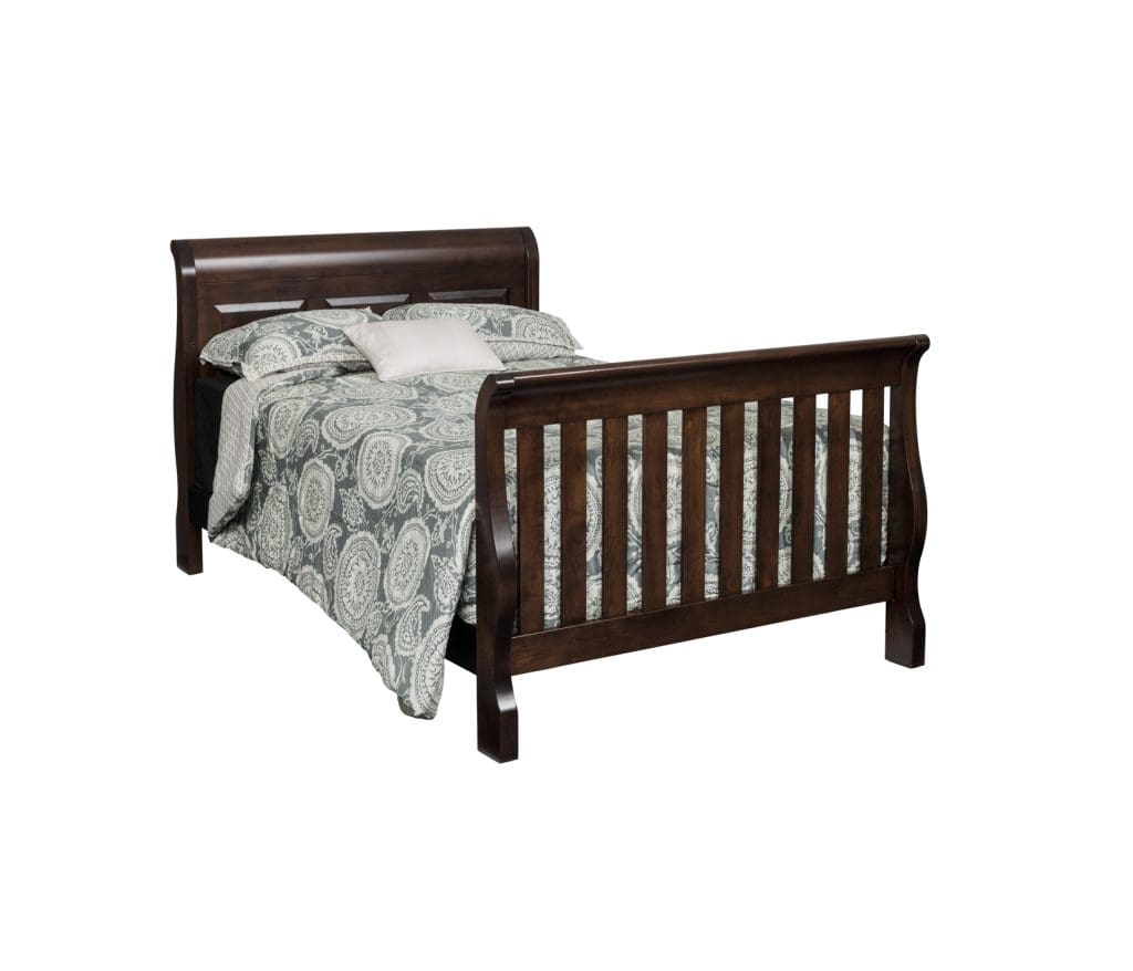 Traditional convertible crib expanded into a child's bed made with dark brown stained hardwood.