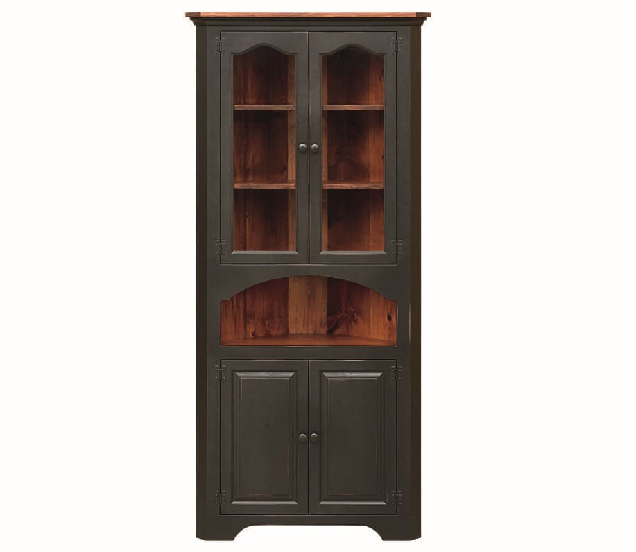 Colonial style large corner cupboard painted dark green with natural wood panel backing, an open shelf in the middle, and 4 cabinets.