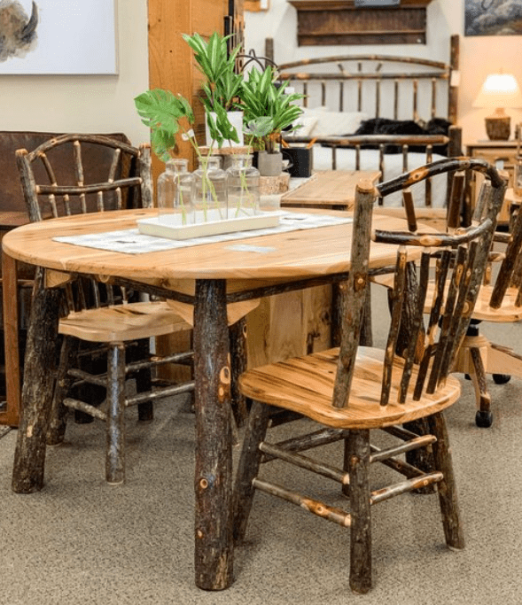 hickory lodge dining set with a table and two chairs, with a plant on the center of the table