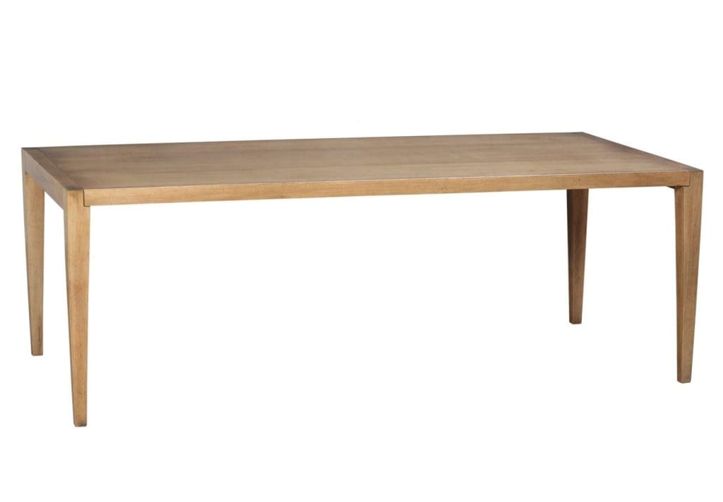 Minimalistic light wood Savanna dining table with a rectangle top and 4 skinny table legs.